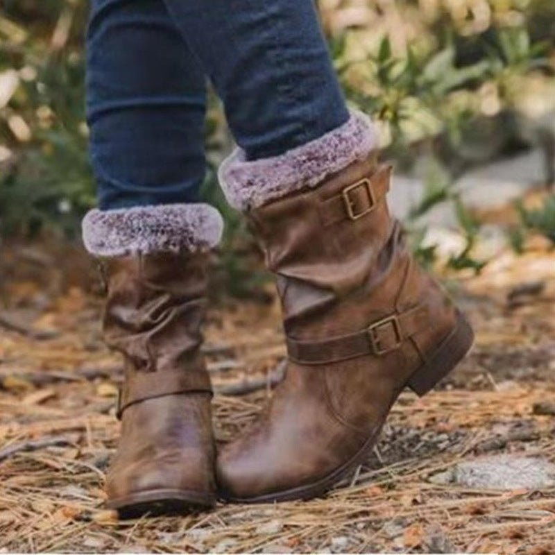 Warm women's snow boots by Ancient Energy, brown leather with fur trim and buckled knee-high design