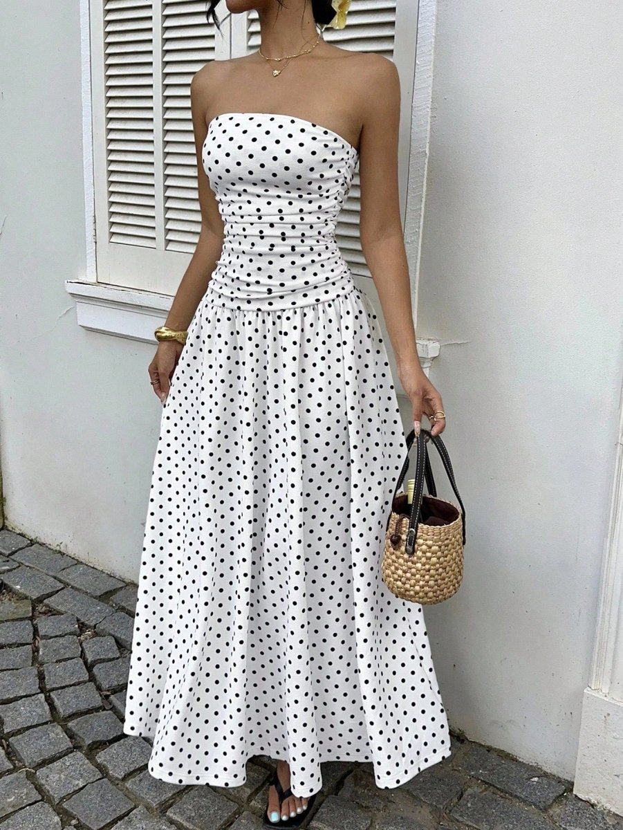 Dress, white with black polka dots; strapless maxi with a fitted high-waist bodice and flowing skirt