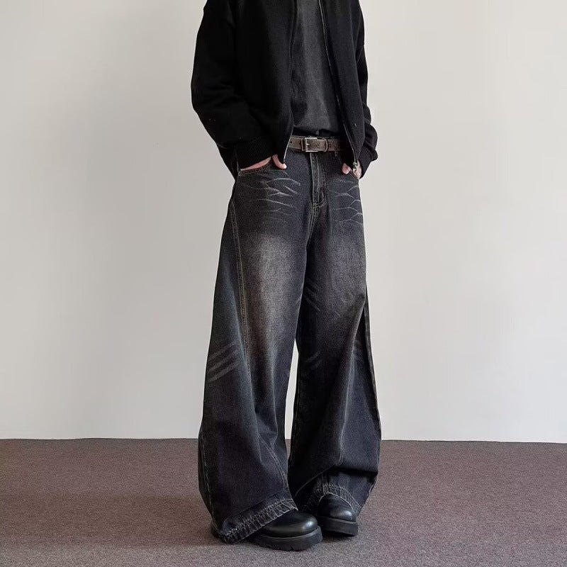 Mens wide-leg denim pants from Ancient Energy, dark wash with distressed detailing.