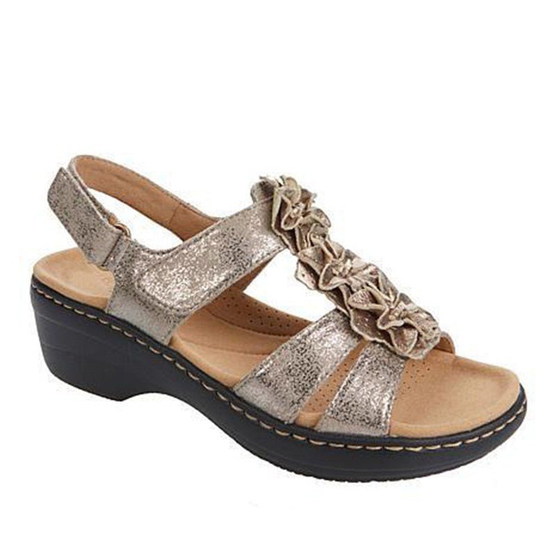 Hollow wedge-heel fish-mouth sandal; metallic gold finish with flower-embellished strap, women's size 43