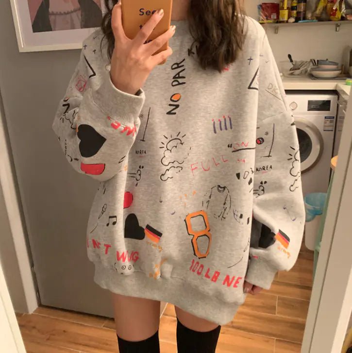 Chic loose gray thick long-sleeve sweatshirt dress with colorful doodles and oversized fit.