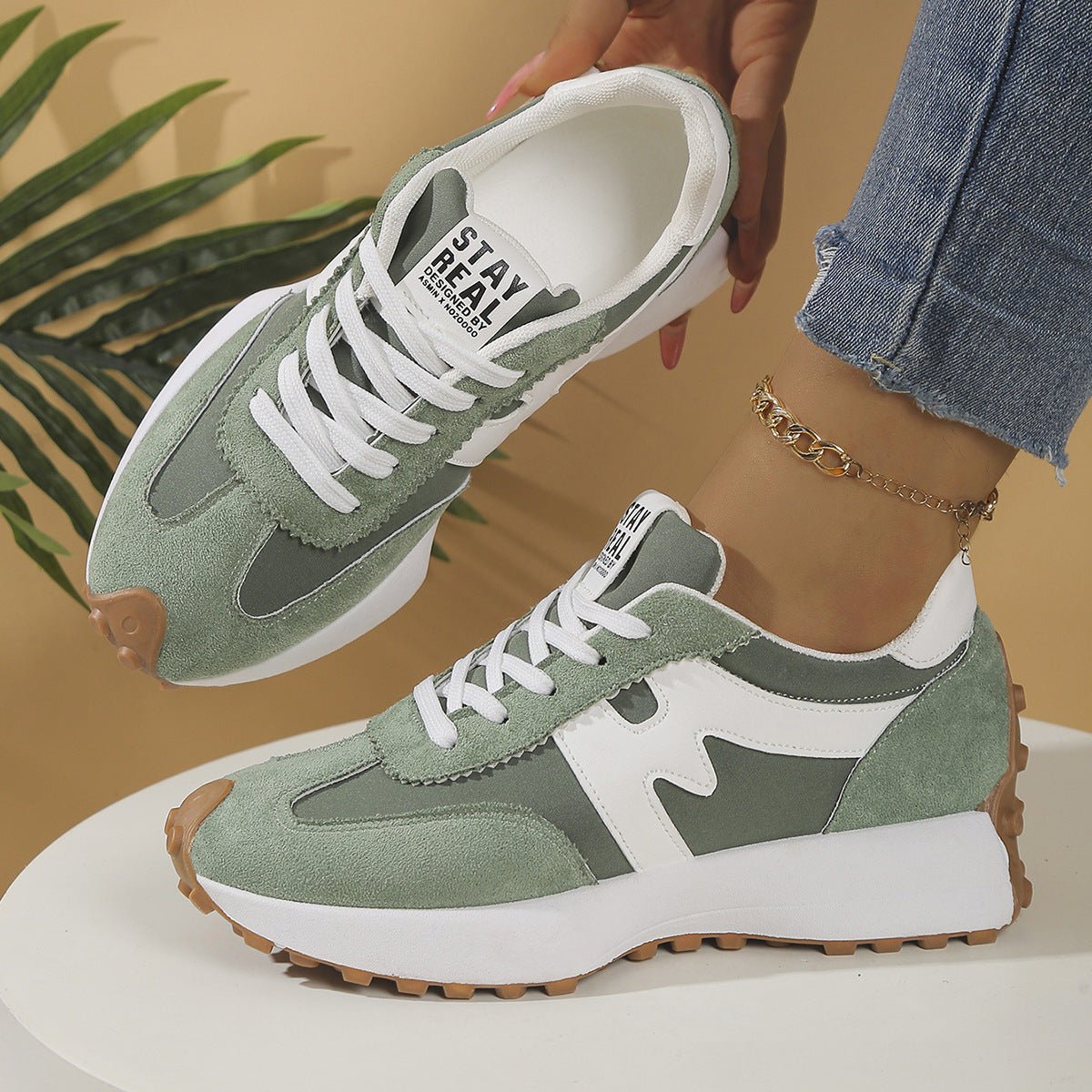 Womens Chunky-Soled Sneakers in sage green suede with white panels, lace-up casual shoes with gum outsole