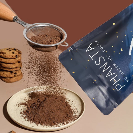 Ancient Energy Cocoa Ground Coffee in a jar, showing dark roasted coffee grounds with a rich, aromatic appearance.
