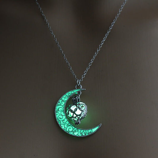 Silver plated glowing pendant necklace with chain from Ancient Energy, showcasing a luminous pendant on a sleek chain.