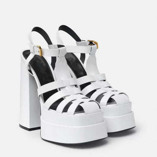 White platform sandals with thick block heels, multiple straps and ankle buckle