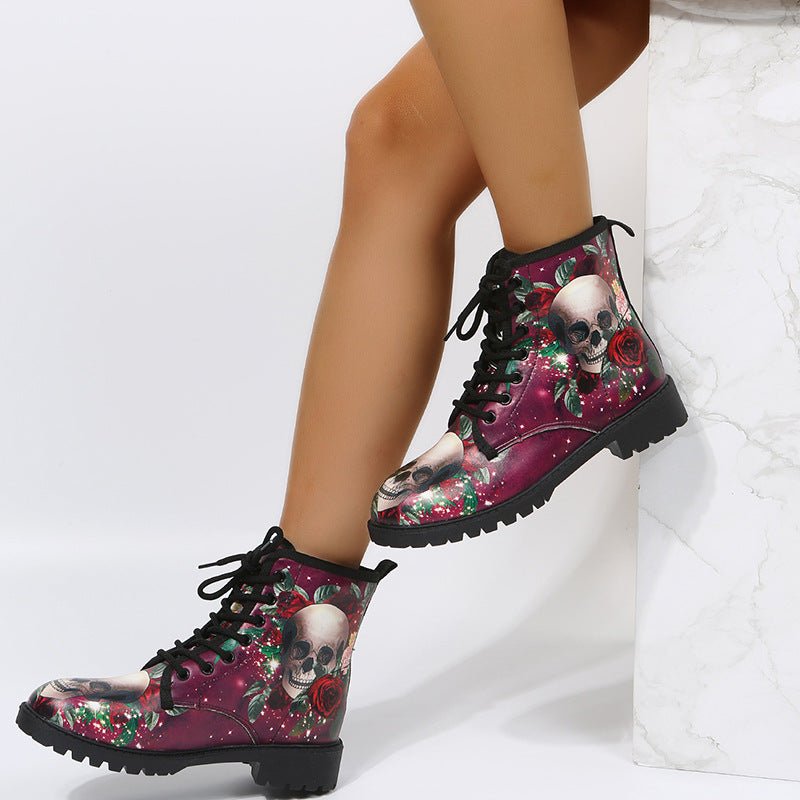 Women's high-top work boots with large skull-and-rose print on purple background, black laces