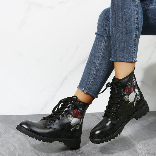 Workwear boots: women's black floral print high-top combat boots with laces by Ancient Energy
