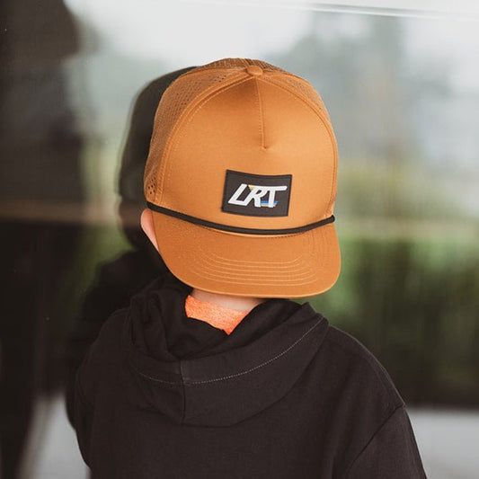 Little Rad Things waterproof age snapback hat in chestnut color with adjustable strap and breathable design.