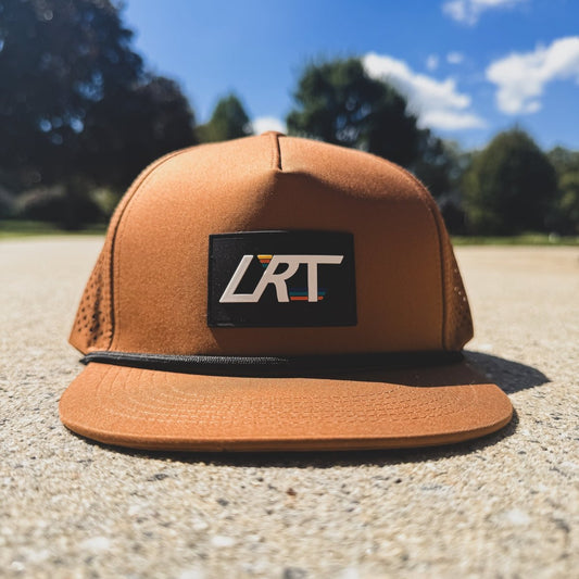 Waterproof age snapback hat by Little Rad Things in chestnut color, featuring adjustable brim and durable waterproof material.