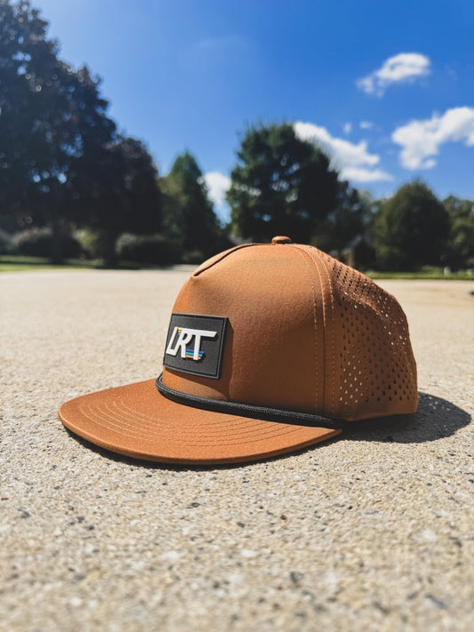 Waterproof age snapback hat in chestnut color by Little Rad Things, featuring a classic design and adjustable strap.