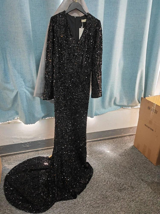 Grey long sleeve sequin evening dress by MANDOTOS, featuring a fitted silhouette and elegant design for formal occasions.