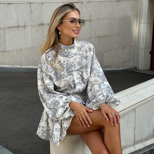 Mandotos ink print long sleeve short dress with puffy sleeves, lapel collar, and A-line silhouette in stylish fashion.