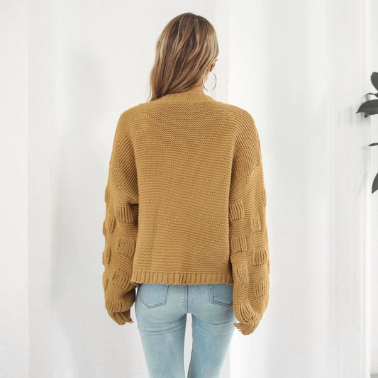 Mandotos women's puff sleeve cardigan sweater with chunky knit texture and front coat style, stylish and cozy knitwear for women.