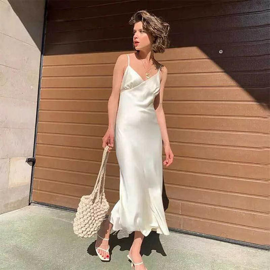 Long swing skirt in sweet plain pattern with collage stitching, made of polyester fiber, by MANDOTOS, shown in the image.