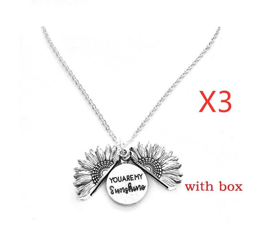Mandotos sunflower double lettering necklace featuring gold chain and pendant with sunflower design and personalized initials.