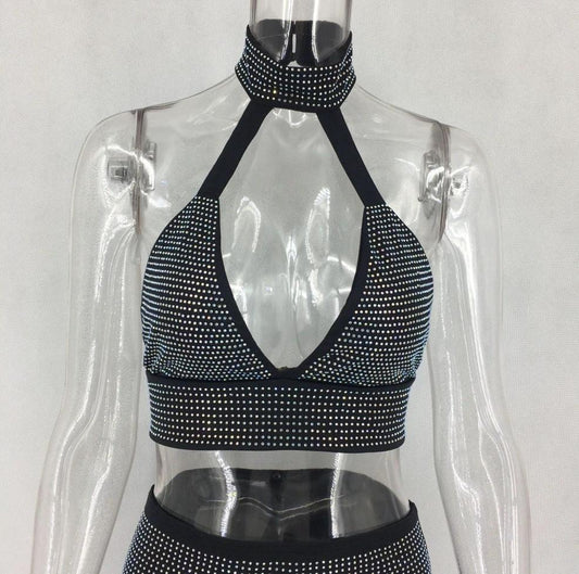 Women’s two-piece dress set by MANDOTOS featuring a stylish diamond-patterned design, perfect for elegant occasions.