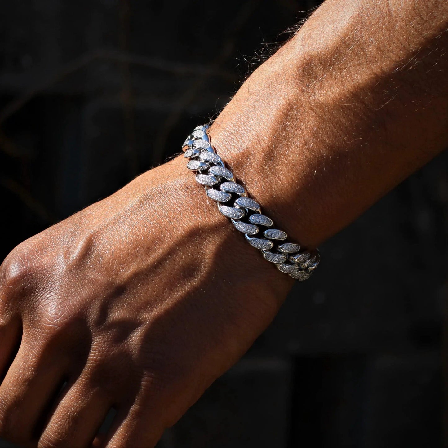12mm white gold diamond Cuban link bracelet from MANDOTOS, showcasing sparkling diamonds and a sleek, bold design.