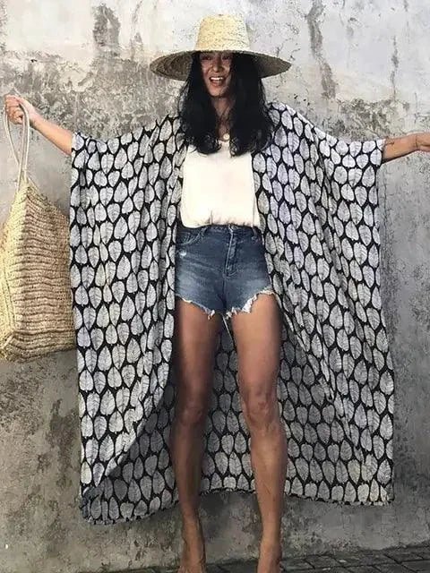 Mandotos Beach Chic Cover-Up featuring lightweight fabric and stylish design, perfect for sun-kissed beach adventures.