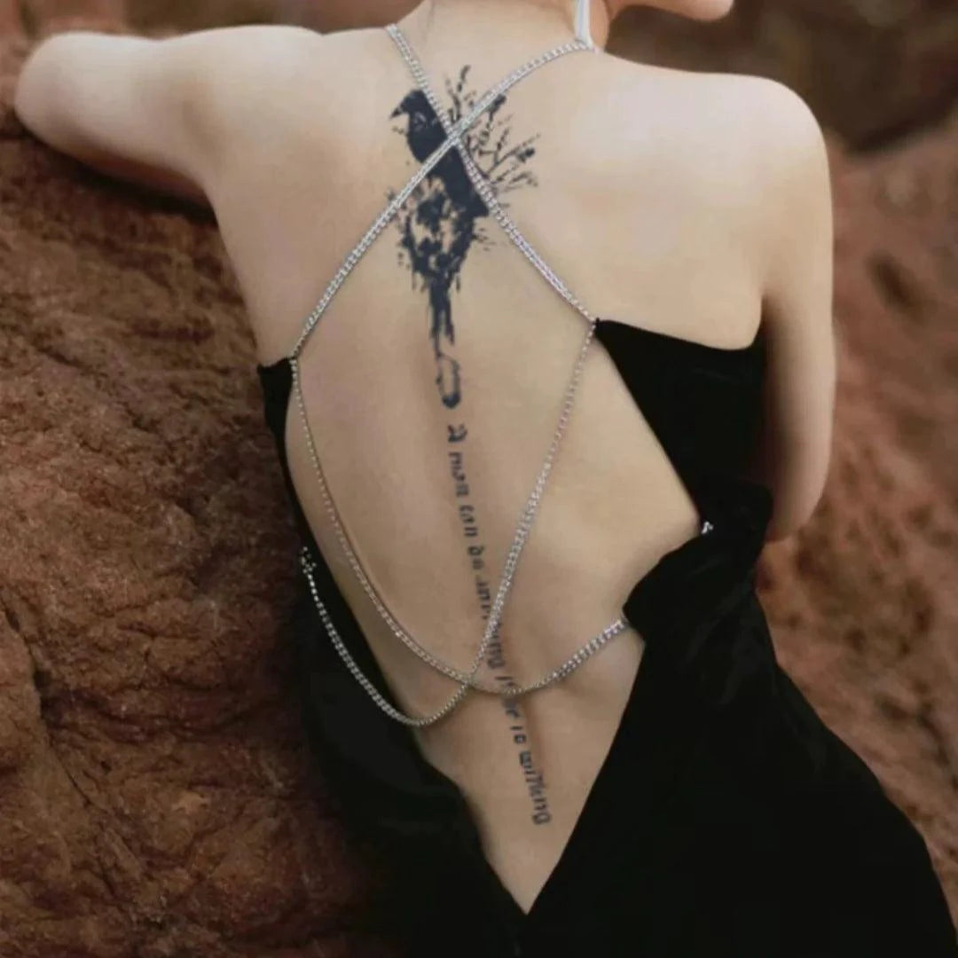 Mandotos botanical spine tattoo decal featuring intricate floral and leaf designs on transparent backing.