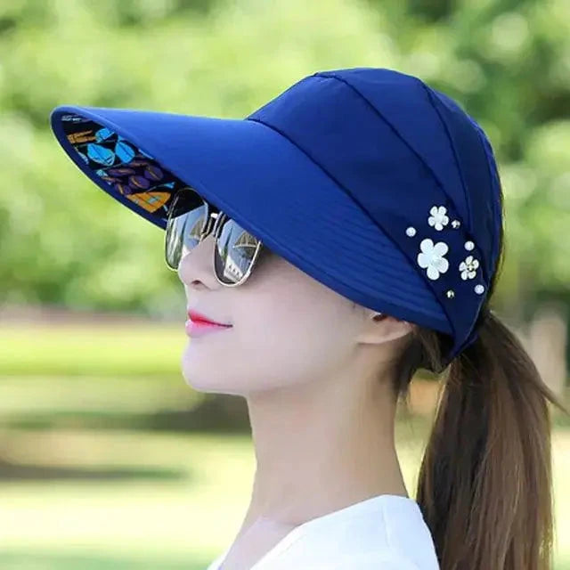 Mandotos Breezy Pearl Visor Hat with wide brim and pearl accents, perfect for sun protection and stylish outdoor wear.