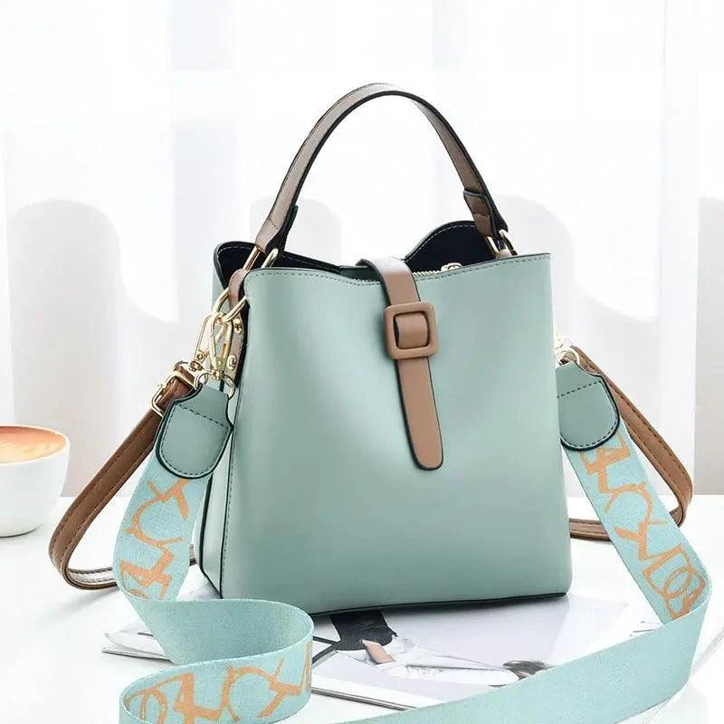 Mandotos Korean style bucket bag with shoulder strap, fashionable cross-border female bag, casual and versatile design.