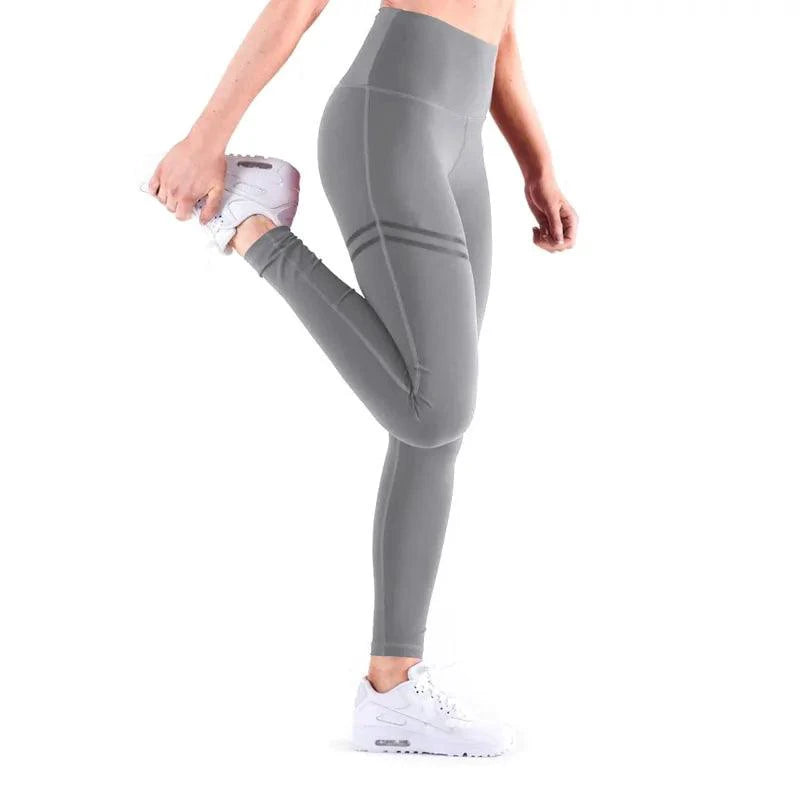 Mandotos chic gold print leggings featuring a stylish gold pattern on black stretchy fabric for a fashionable look.