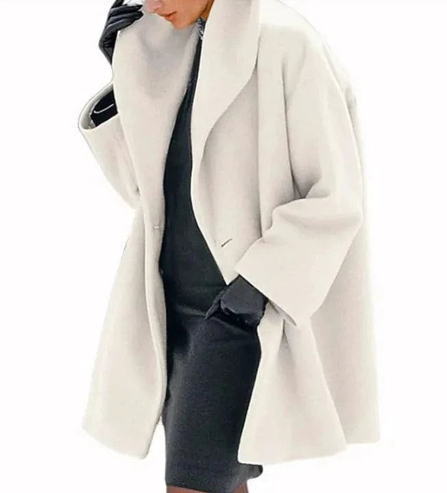 Mandotos oversized cardigan in multiple shades, featuring a relaxed fit with a cozy knit texture and colorful, stylish design.