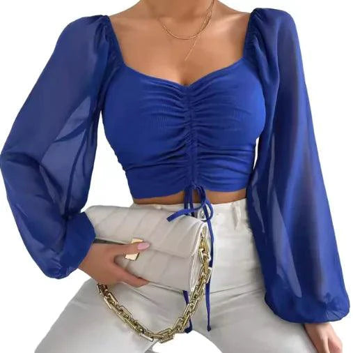 Mandotos chic V-neck balloon sleeve crop top, featuring stylish design and fitted silhouette, perfect for casual and trendy outfits.