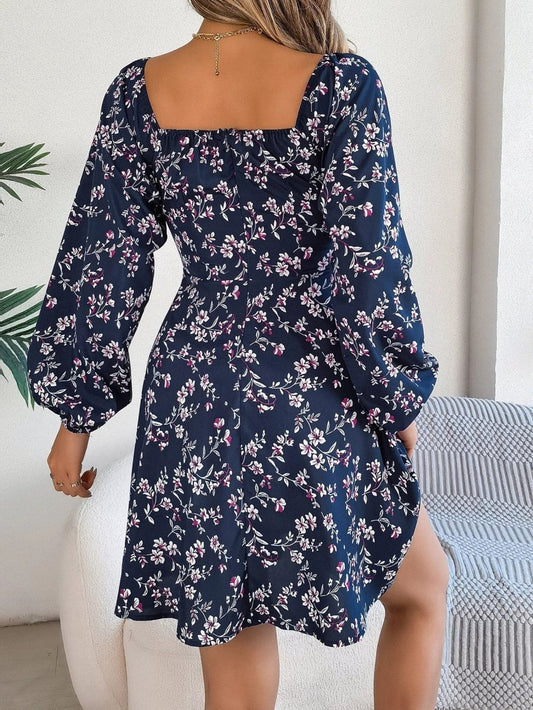 Mandotos floral print red lantern sleeve dress with square neck, tie waist, and long A-line silhouette.