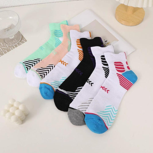 Mandotos trendy sports socks, 6 pairs of moisture-wicking ankle socks for running and hiking, shown in a bundle with colorful designs.