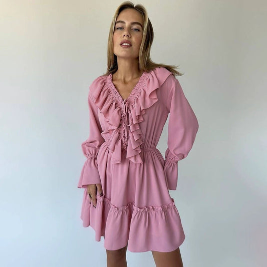 Mandotos V-neck pleated ruffle dress with Y2K style, flared short sleeves, and a flowy silhouette.