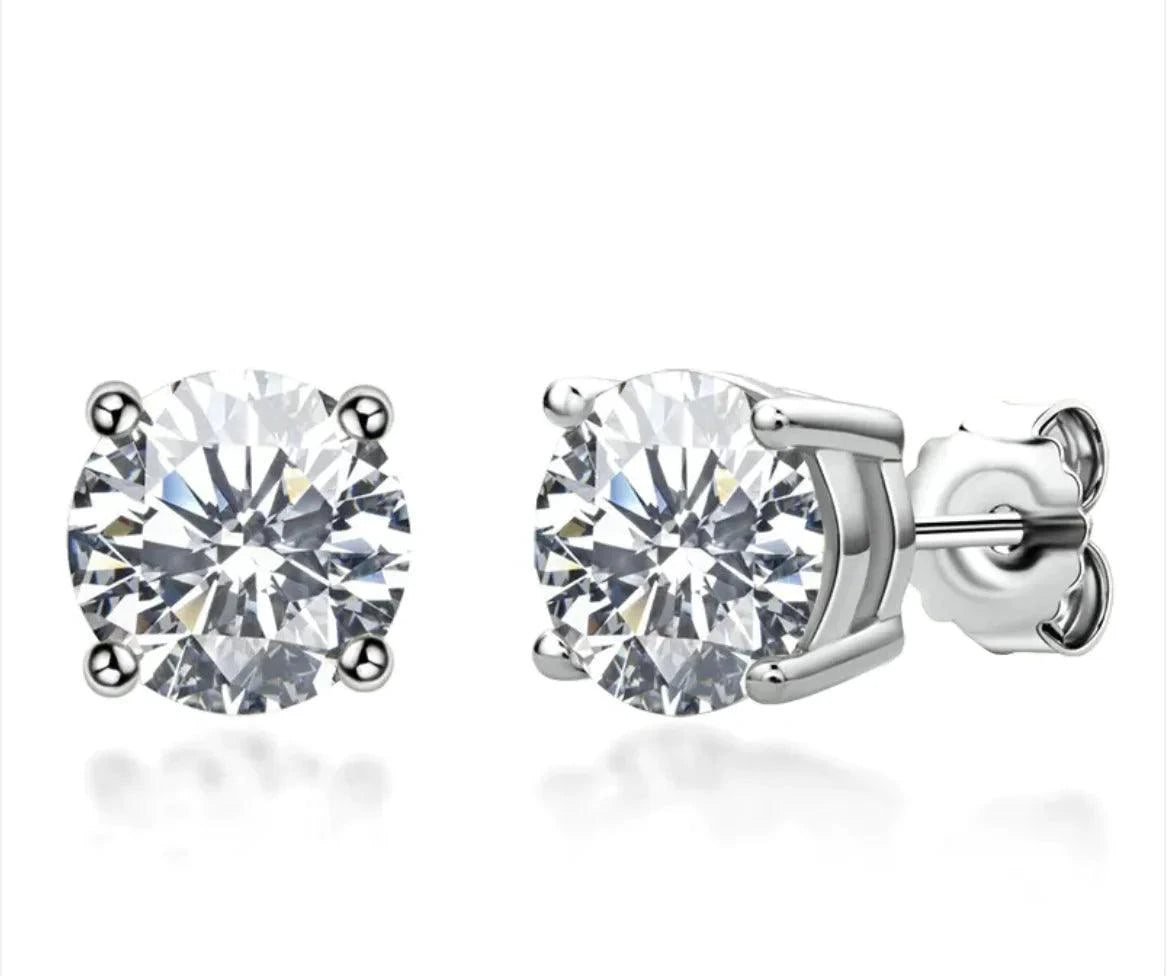 Elegant 18K gold moissanite silver stud earrings featuring sparkling gemstones and a sleek, stylish design.