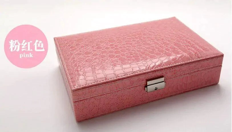 Elegant leather vanity case by MANDOTOS with a sleek design, featuring a compact shape and quality leather finish.