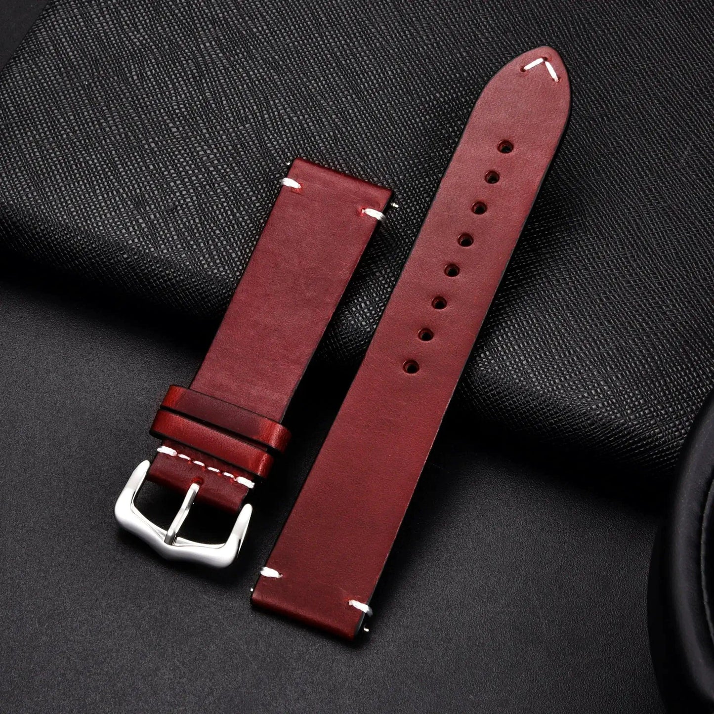 Elegant MANDOTOS leather watch band with stitched detailing, suitable for classic wristwatch styles.