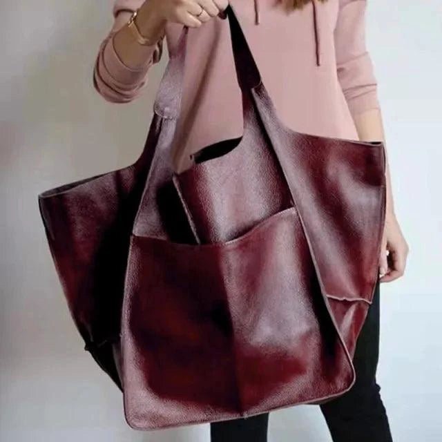 Elegant women's tote bag by MANDOTOS featuring a stylish design and spacious interior, perfect for everyday use.