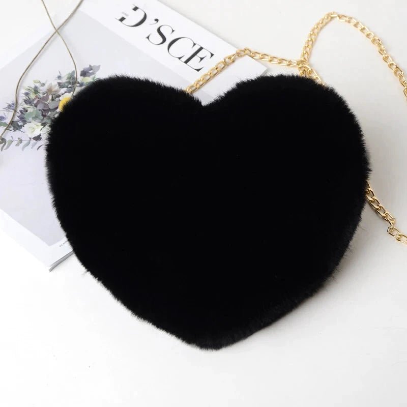 Mandotos women's heart-shaped faux fur crossbody bag with plush soft shoulder strap and chain detail, stylish shopper tote for women.