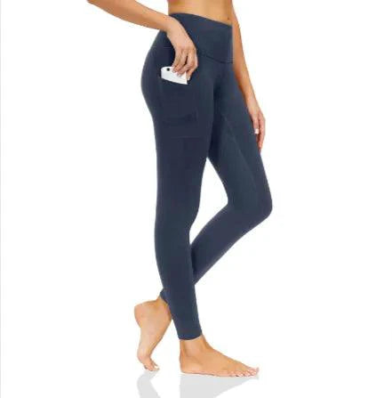 Mandotos FlexiForm high-waist fitness leggings shown on a model, featuring stretchy fabric and a sleek black design for workout comfort.