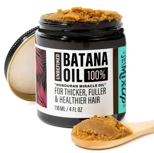 Mandotos Glow Restore Hair Mask in a jar, featuring rich, nourishing formula for healthy, shiny hair.