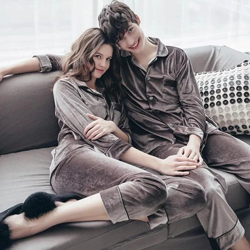 Gold velvet pajamas from MANDOTOS with a soft, luxurious fabric and relaxed fit, shown on a model in a cozy bedroom setting.