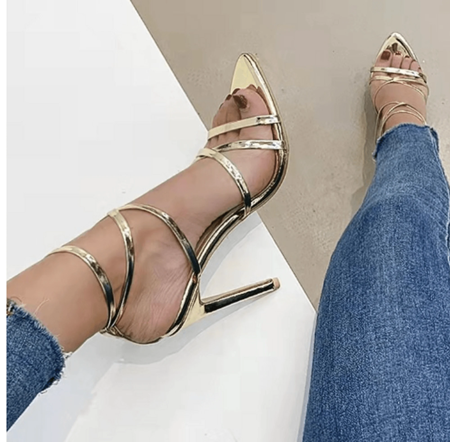 Golden strappy stiletto pumps by MANDOTOS featuring sleek design and high heels, perfect for formal or evening wear.