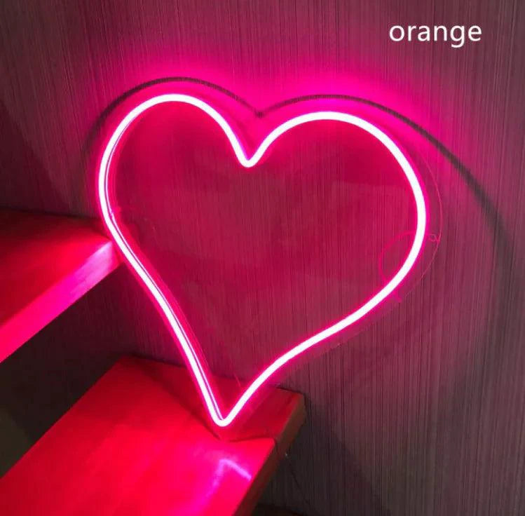 Mandotos Heart Glow LED Neon Light glowing in pink, decorative neon sign for home or party decor.