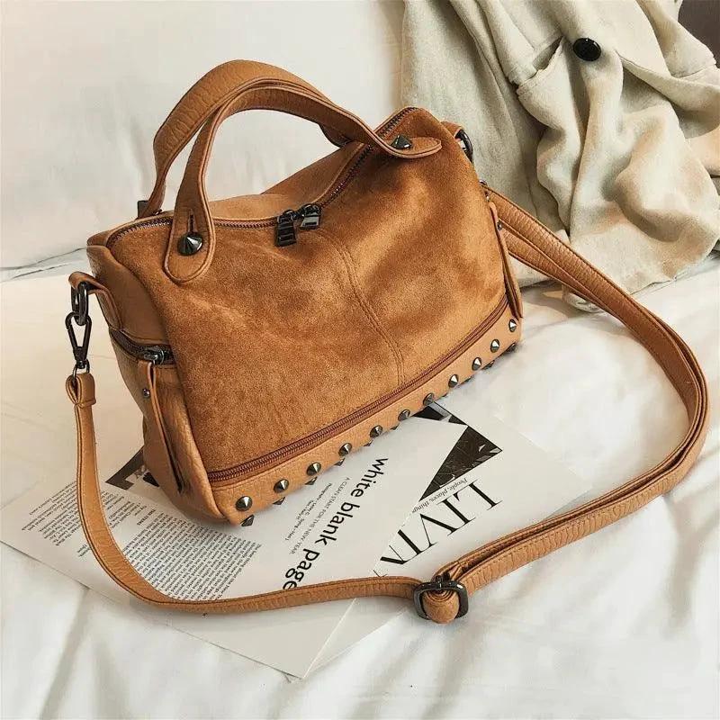 High-quality big casual tote shoulder bag for women by MANDOTOS, soft fabric with spacious design and sturdy handles.