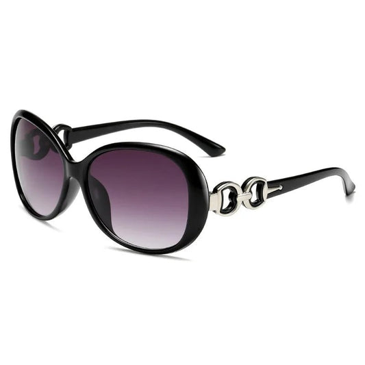 Vintage retro oversized sunglasses for women by MANDOTOS INTERNATIONAL, stylish travel eyewear with chic oversized frames.