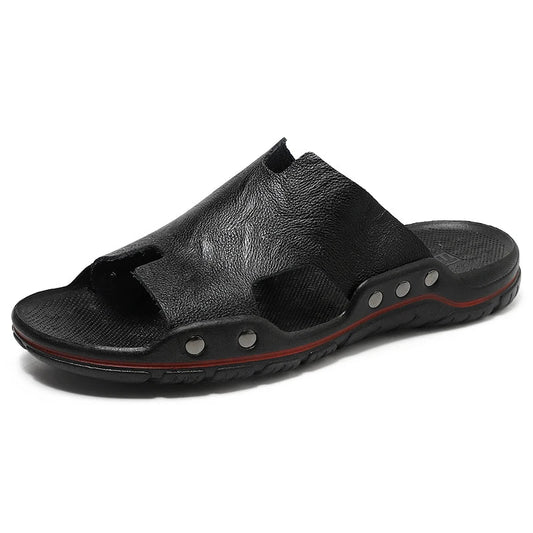 Retro leather men's summer beach slippers by MANDOTOS INTERNATIONAL featuring flat sandal design and casual open-toe style.
