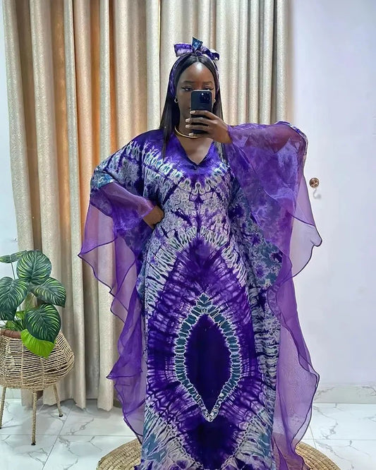 African Dashiki Ankara maxi long dress for women, traditional clothing by MANDOTOS INTERNATIONAL with vibrant patterns