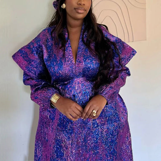 Traditional African dress for women featuring Ankara and dashiki styles, long maxi gown with vibrant patterns by MANDOTOS INTERNATIONAL.