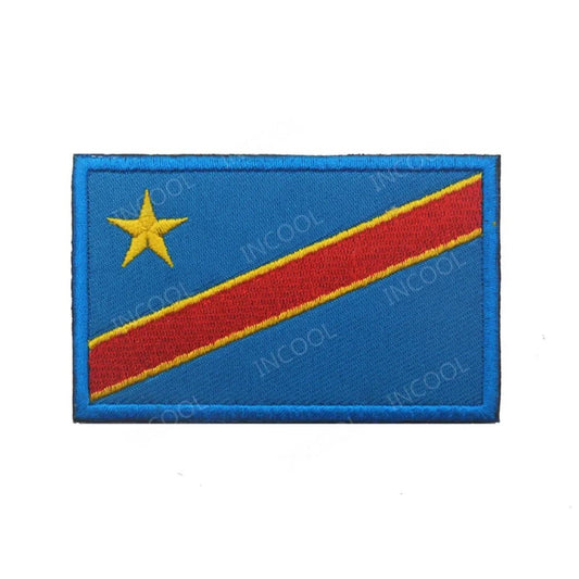 Embroidery patches of African flags and badges featuring Morocco, Nigeria, Gabon, Libya, and Namibia by MANDOTOS INTERNATIONAL.