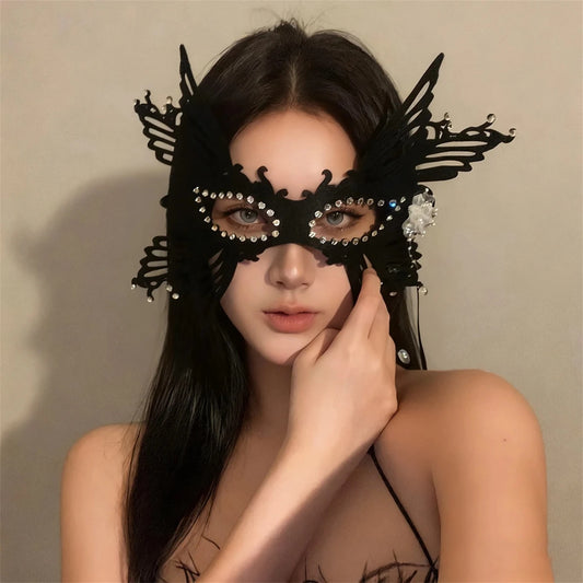 Elegant velvet mask from MANDOTOS INTERNATIONAL, perfect for Halloween and masquerade balls, featuring intricate design and mysterious style.