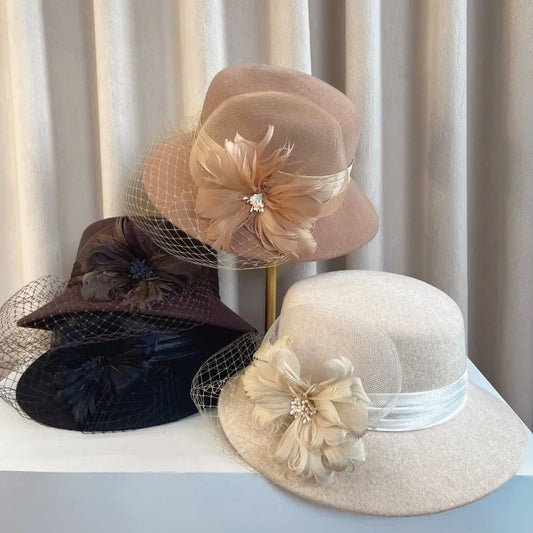 Elegant floral top hat from MANDOTOS INTERNATIONAL, ideal for autumn winter fashion, weddings, and parties for women.