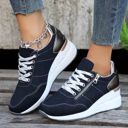 Fashionable lace-up sneakers with zipper detail and medium heel height by MANDOTOS INTERNATIONAL, showcasing stylish footwear for trendy outfits.